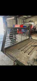 Fabricated steel flatbed with upright rack