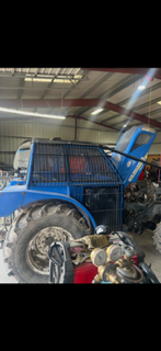 Protective steel structure fitted to agricultural tractor cab