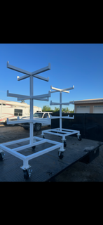 White custom fabricated material stands