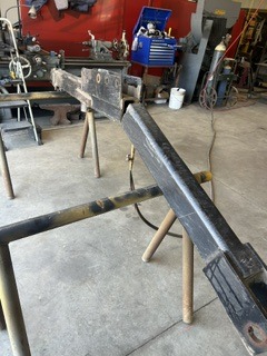 Steel trailer tongue under fabrication in the shop